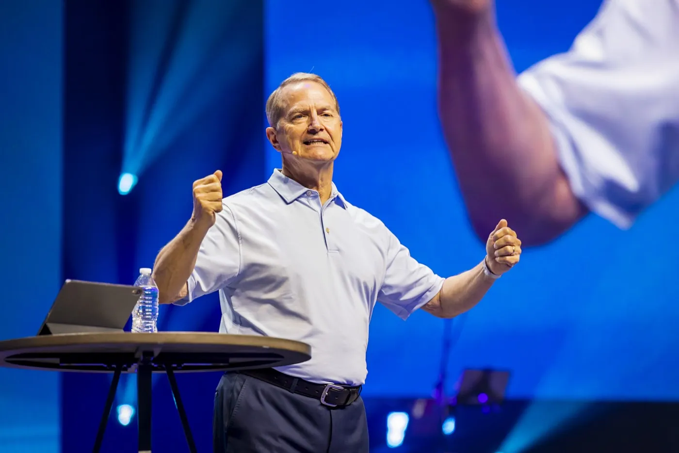 Speaker on stage at conference