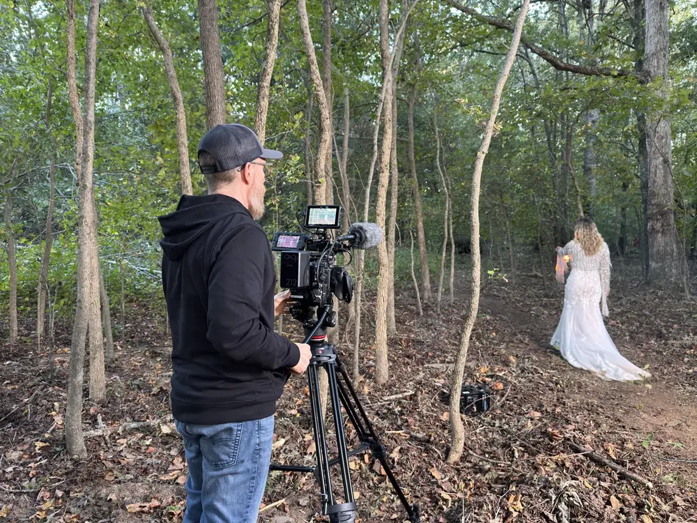 Billy Altman filming on location in the woods during a music video shoot