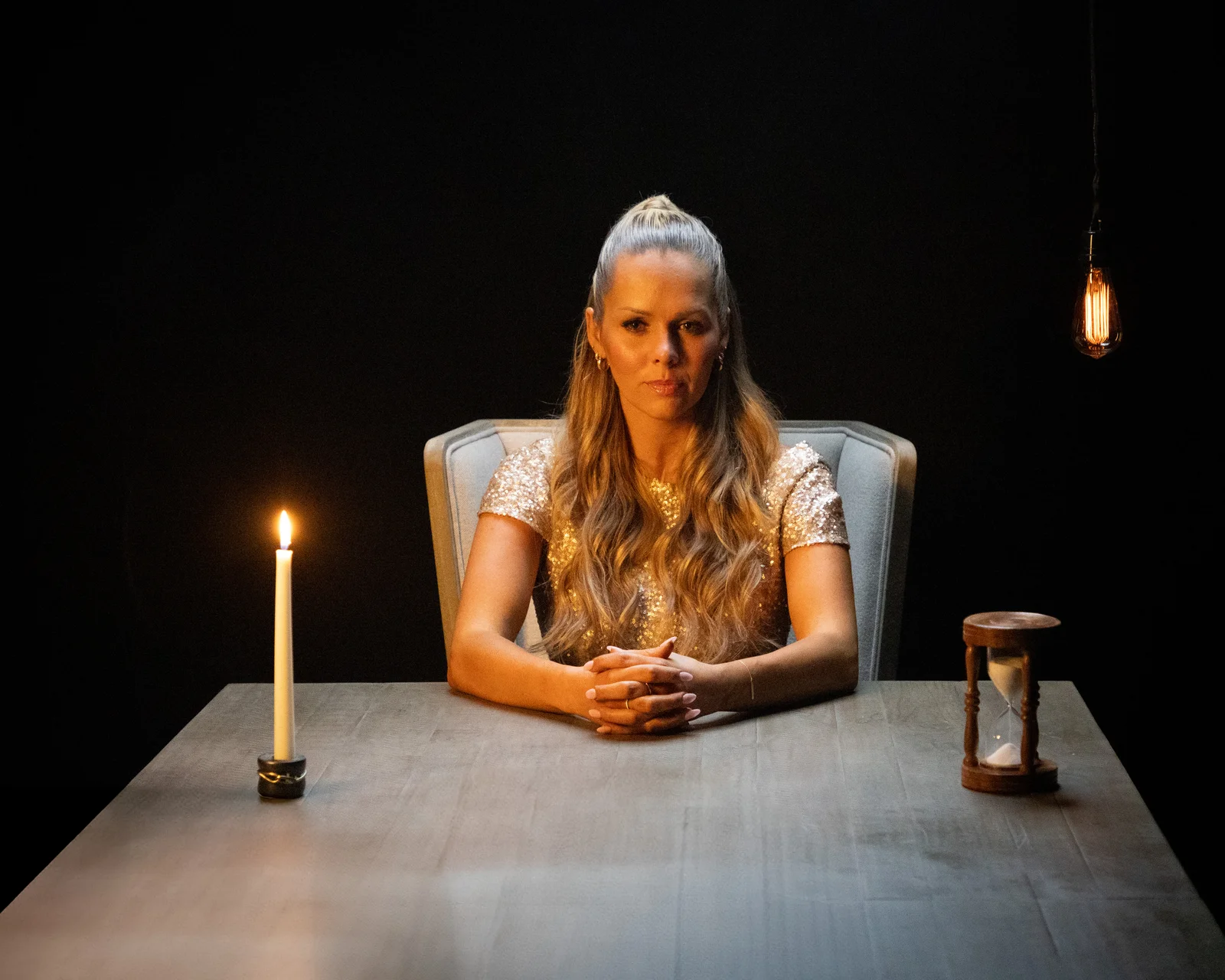 Kara Jane with candle and hourglass — Sound the Alarm