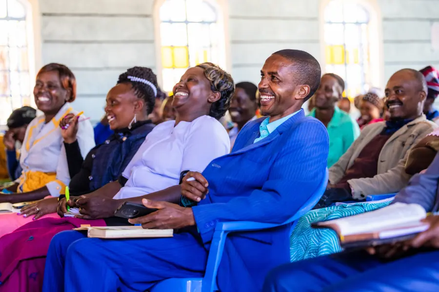 Congregation laughing together during a service